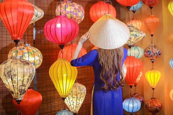 wearing an Ao Dai dress during the shoot